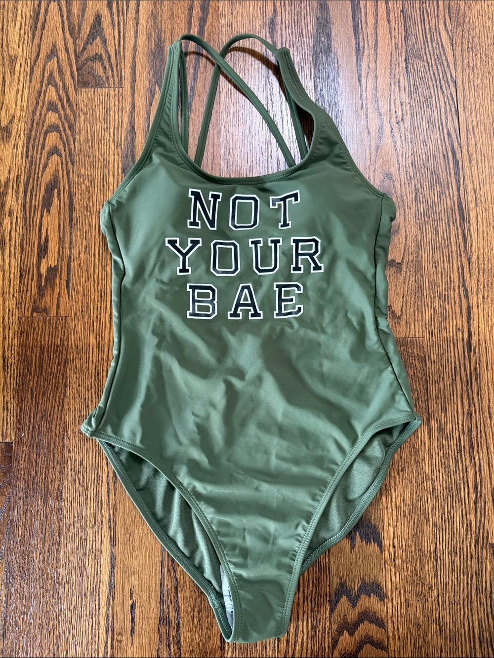 No Boundaries Women’s Olive Green One-Piece Swimsuit with "NOT YOUR BAE" Graphic